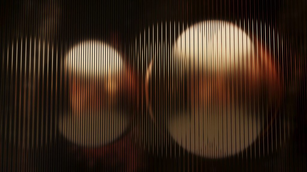 Orbs are seen through vertical stripes.