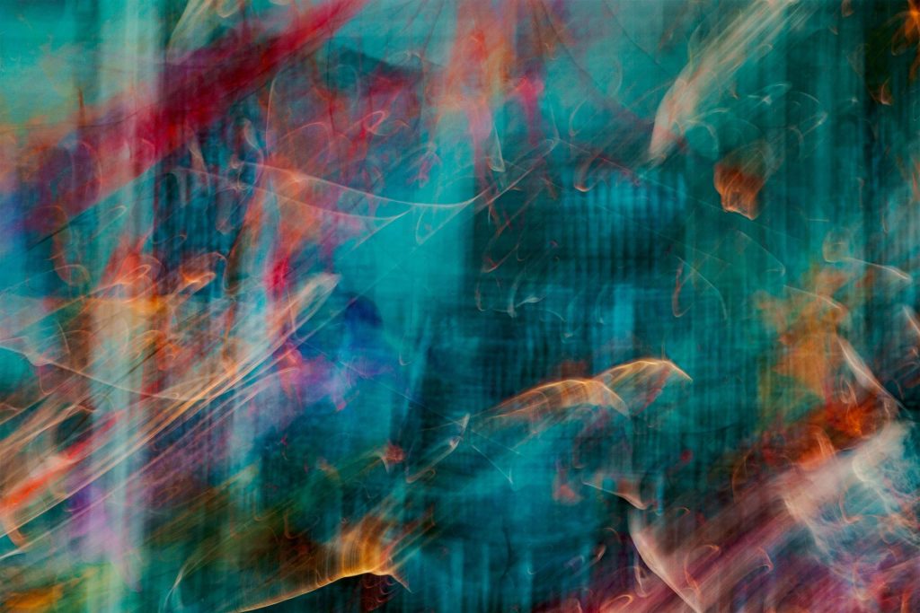 an abstract painting of a blue and red background